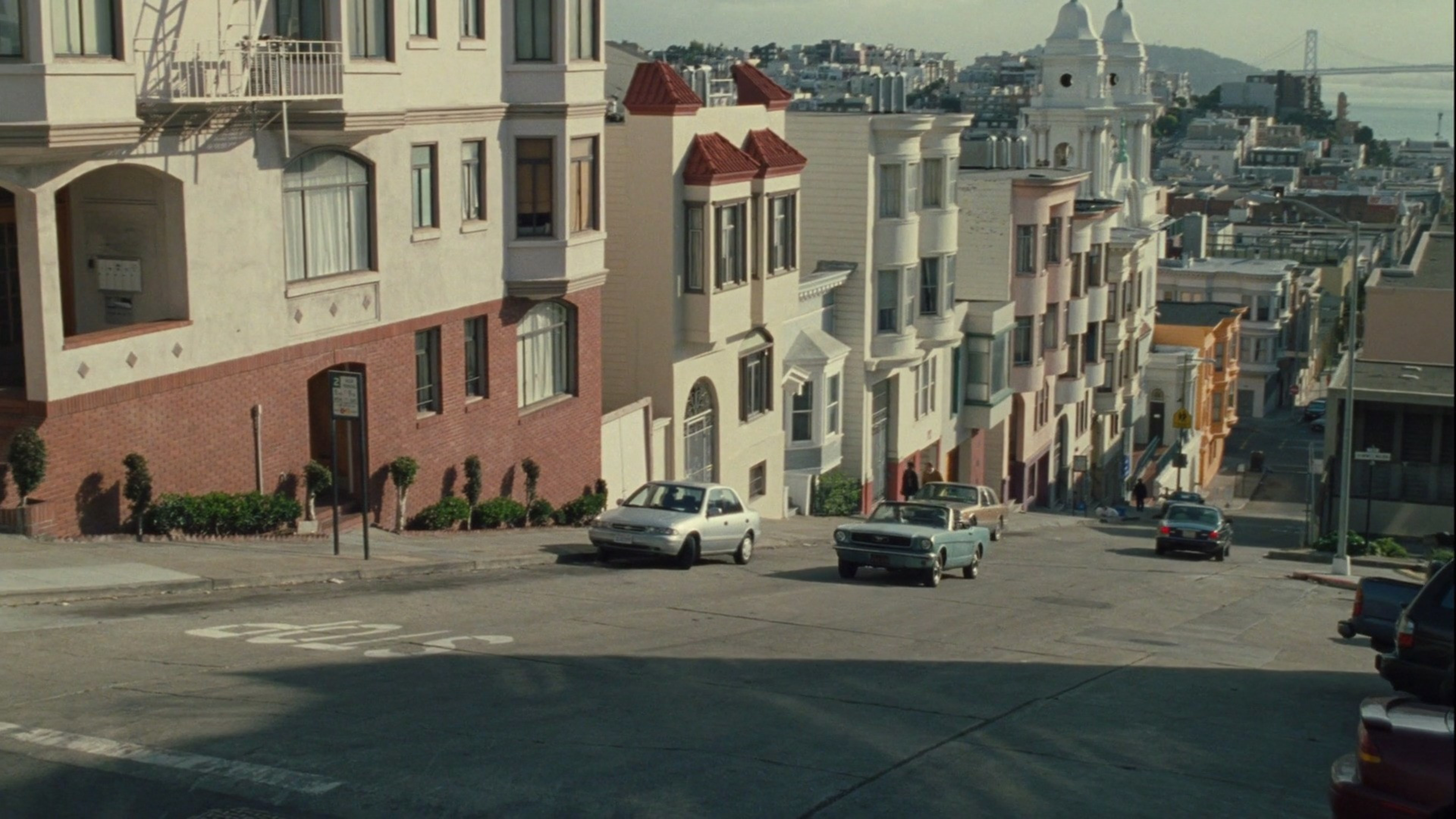 A Ford Mustang climbs one of San Francisco's famous hills.