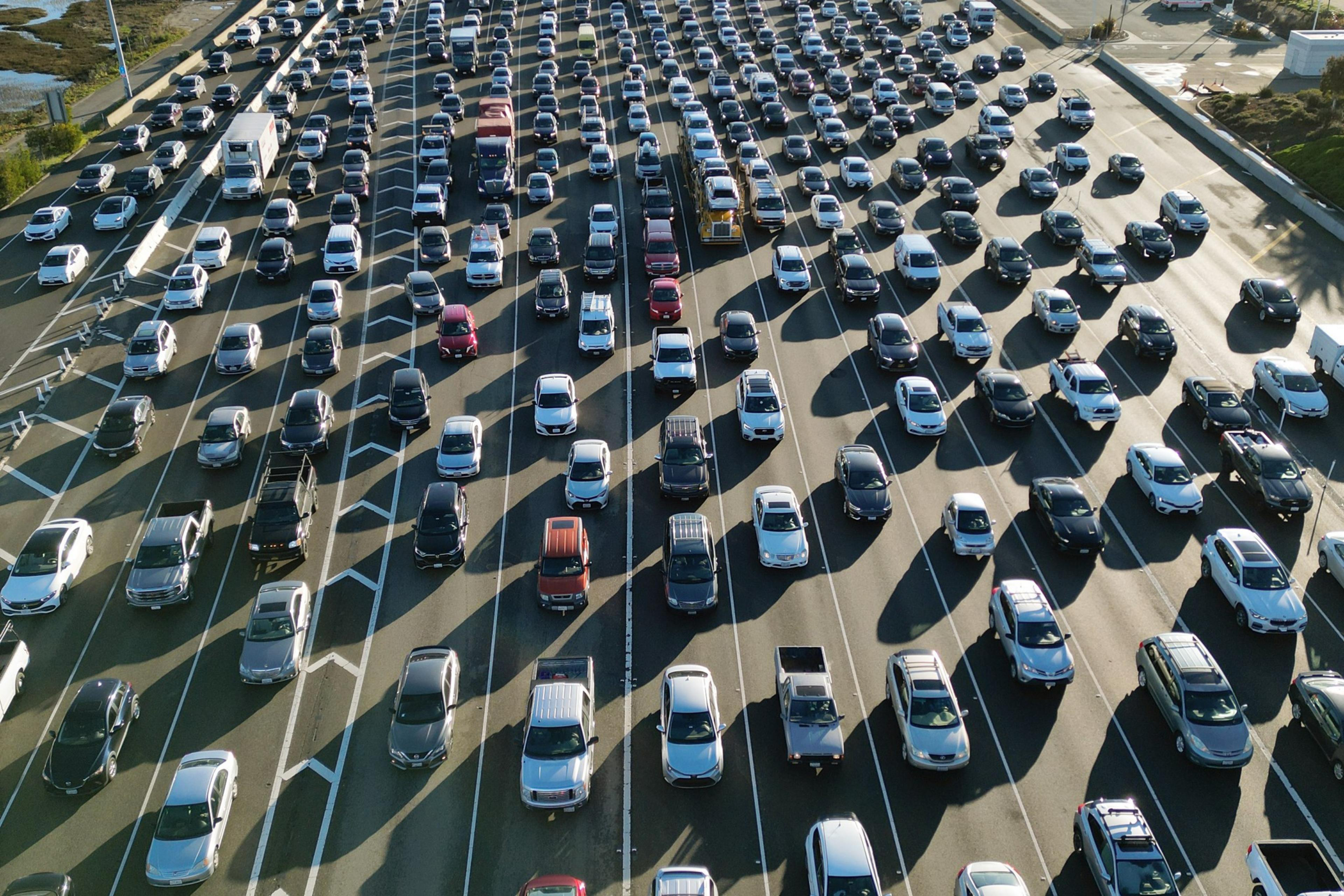 Cars sit in traffic.