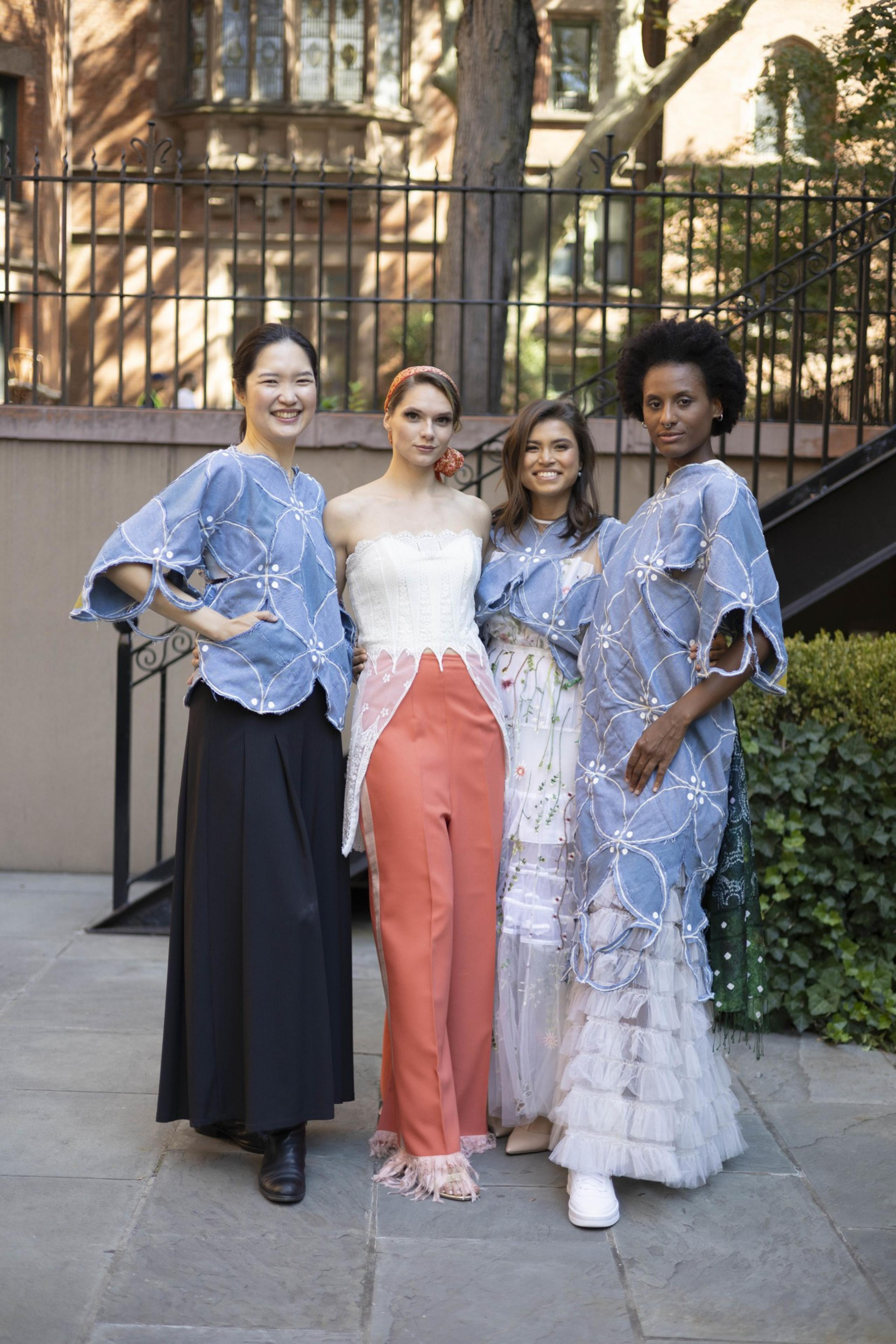A group of four women posing