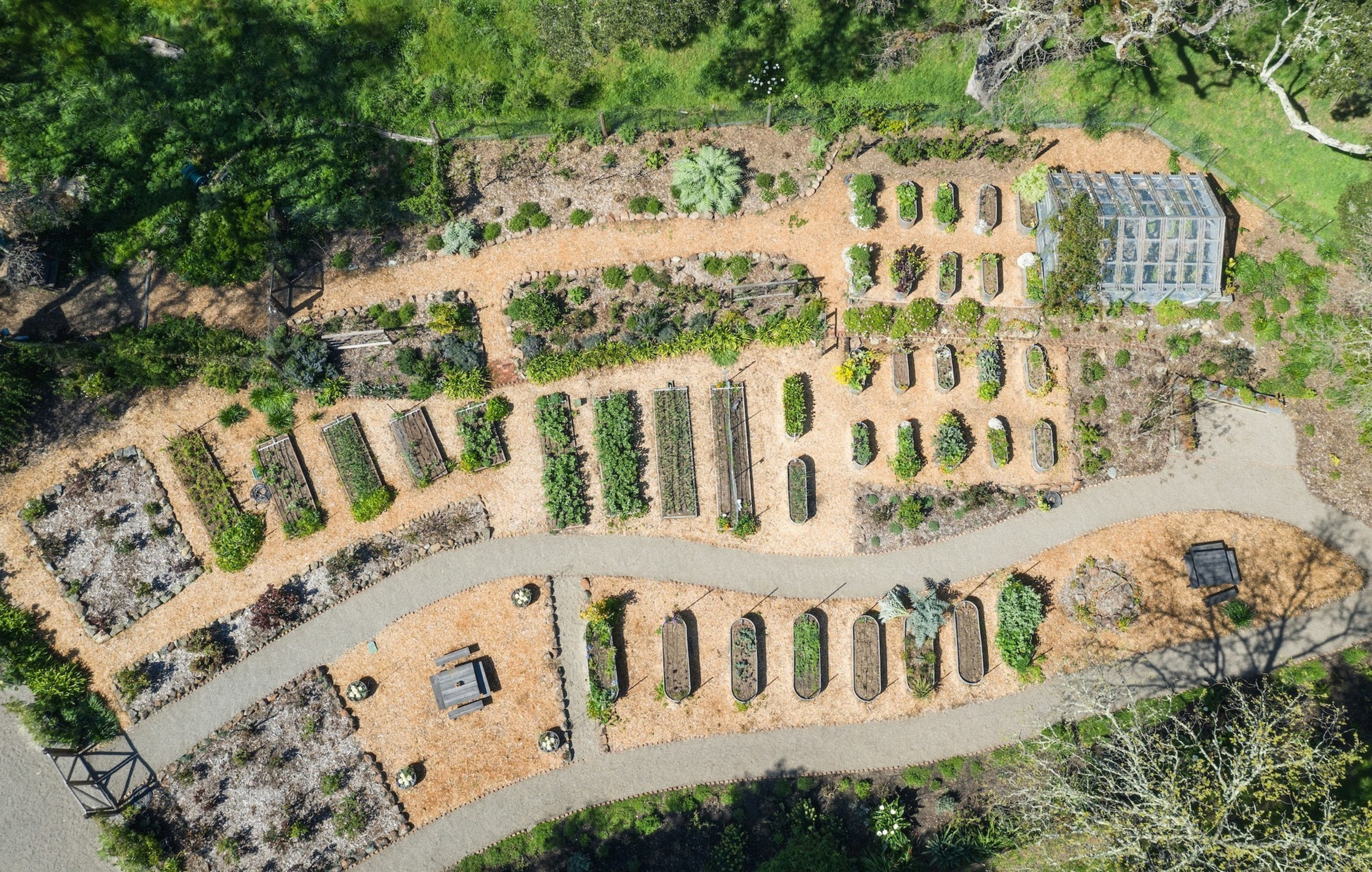 An arial view of a plot of land with a garden. 