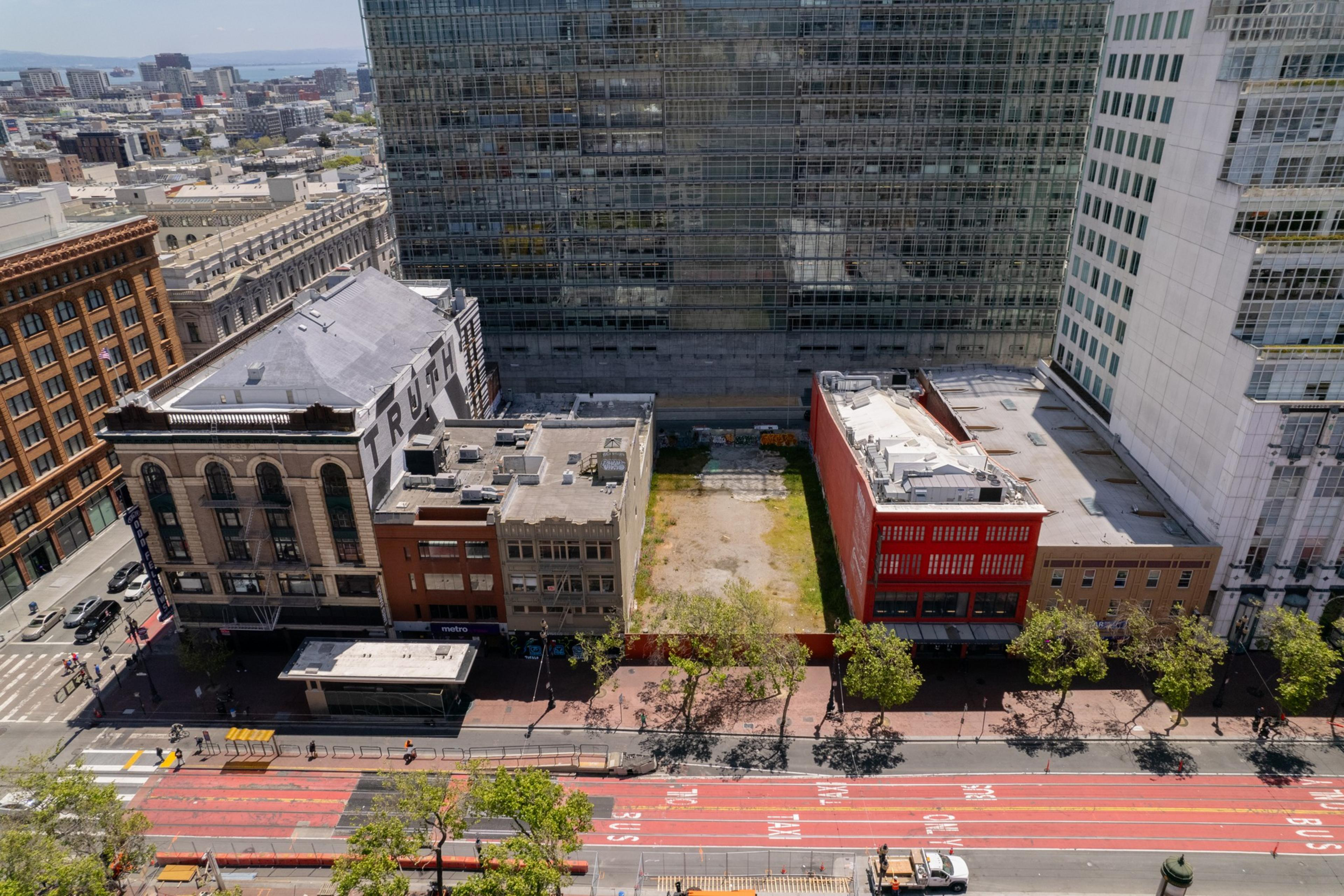An empty lot is seen in a photo.