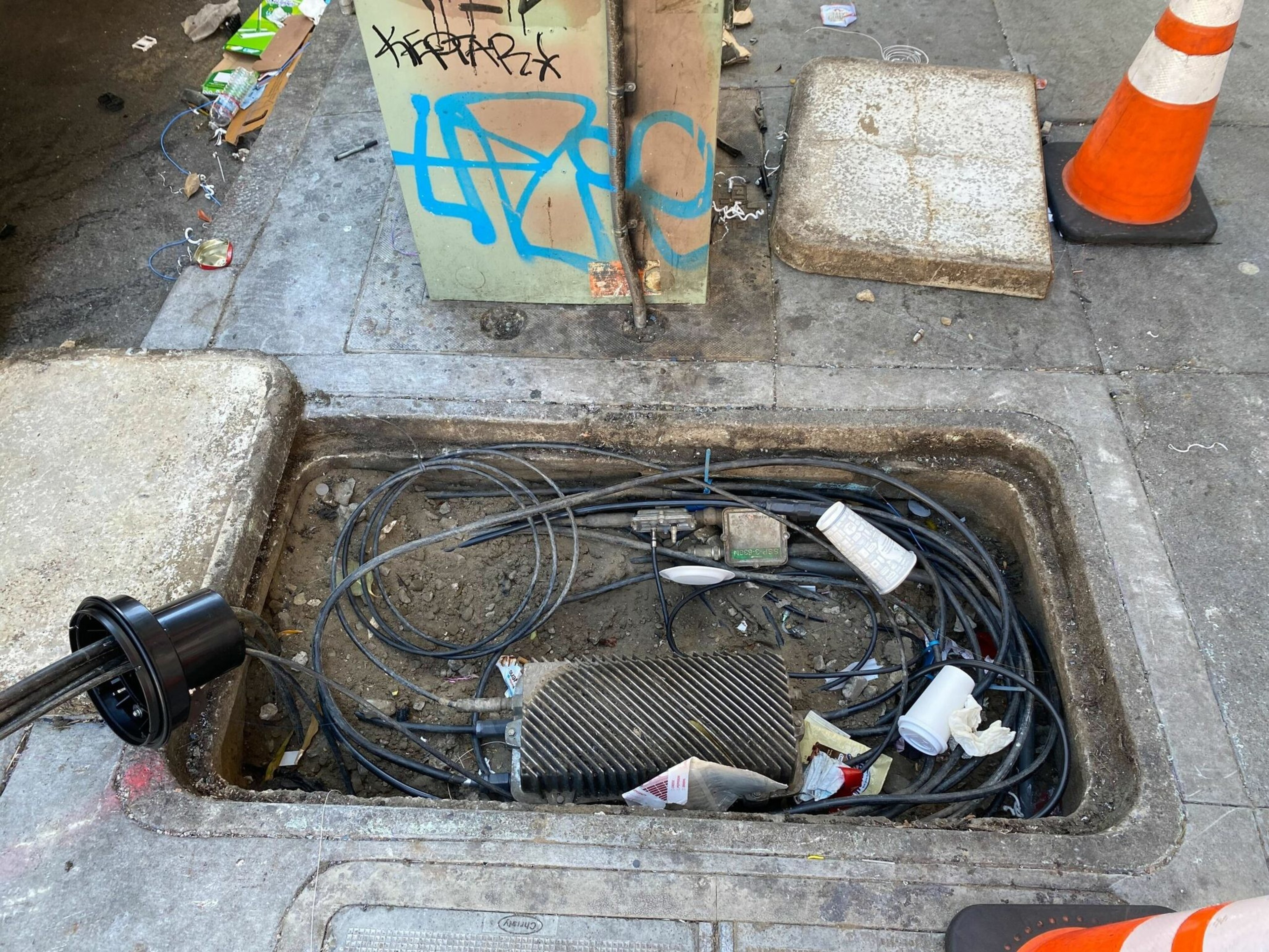 A damaged Comcast box at Hyde and Geary streets | Morgan Ellis/The Standard