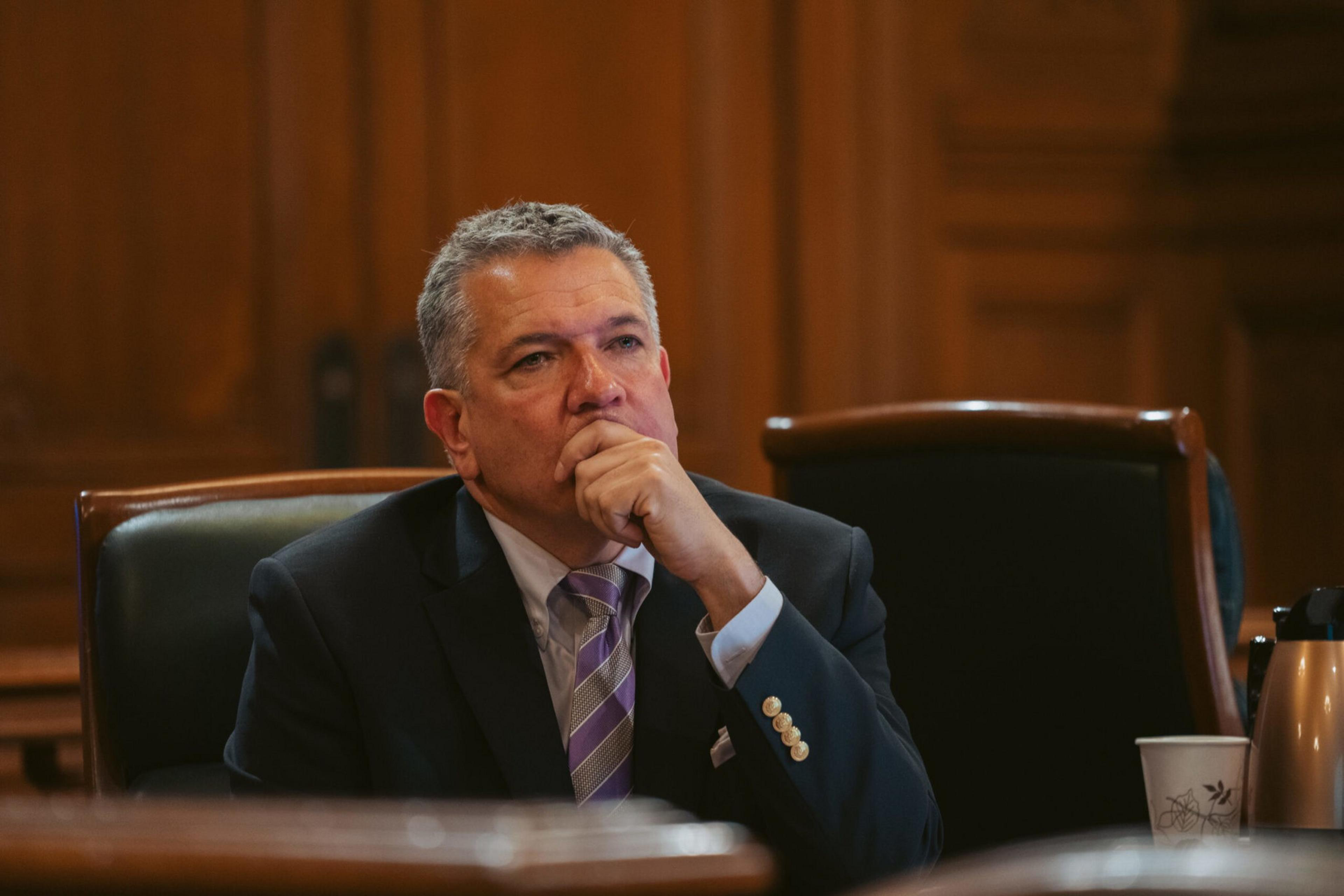 San Francisco Supervisor Matt Dorsey listens during a Board of Supervisors meeting at City Hall.