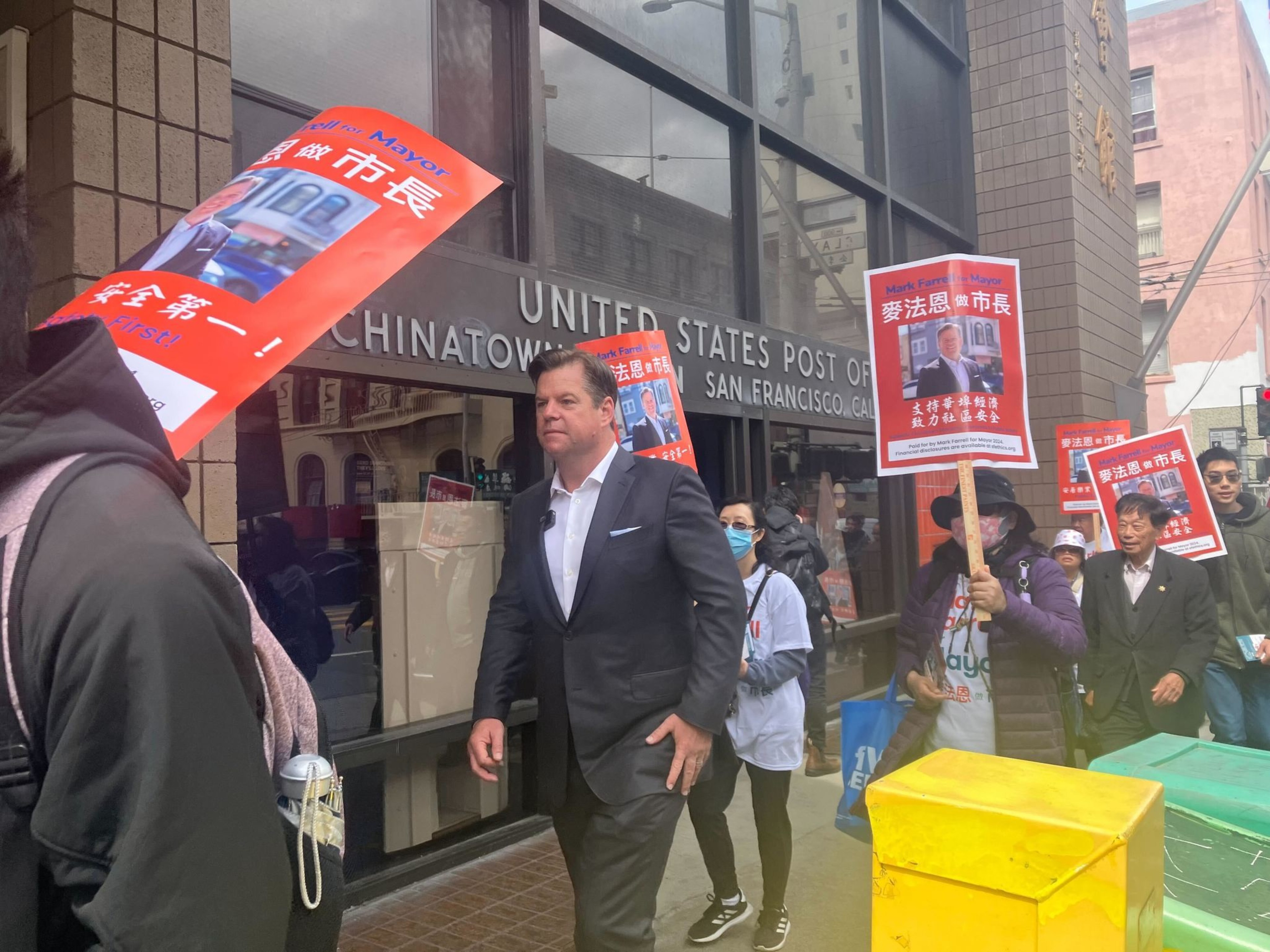 Ex-Mayor Mark Farrell walks through Chinatown while campaigning in the neighborhood on Saturday, March 30, 2024.