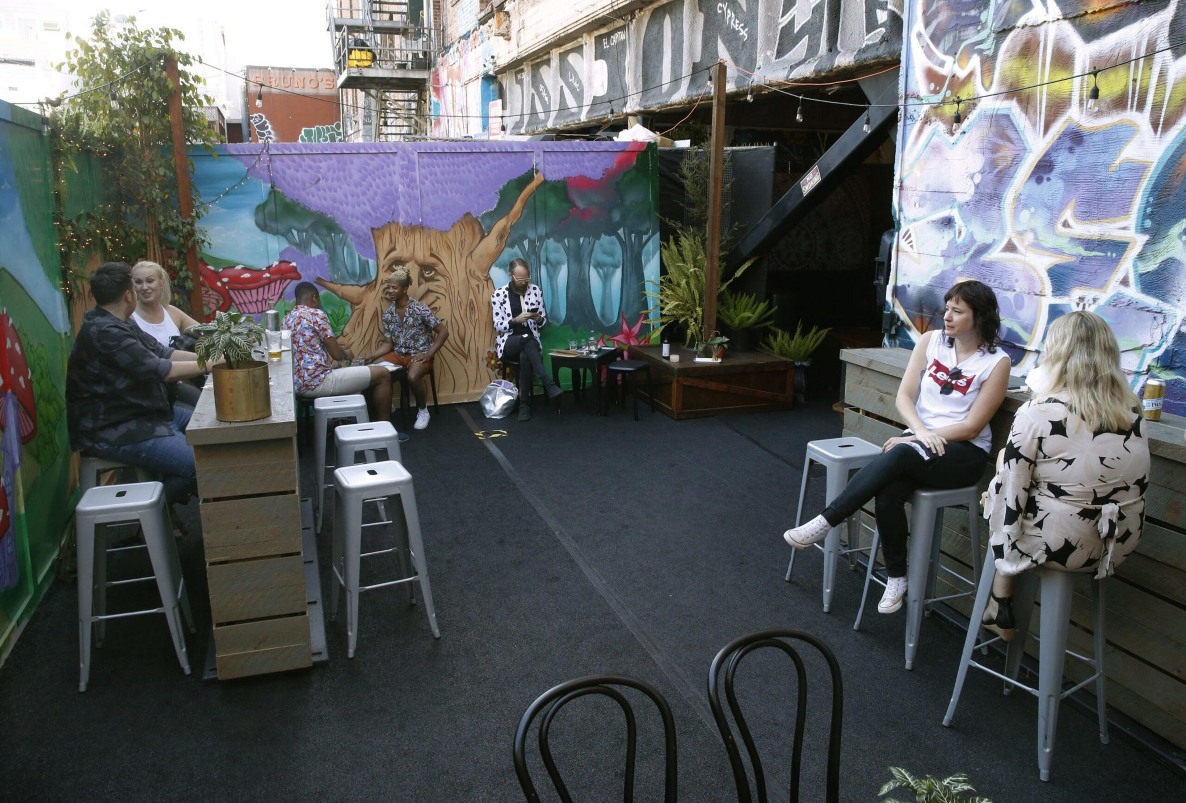 a dive bar patio by day
