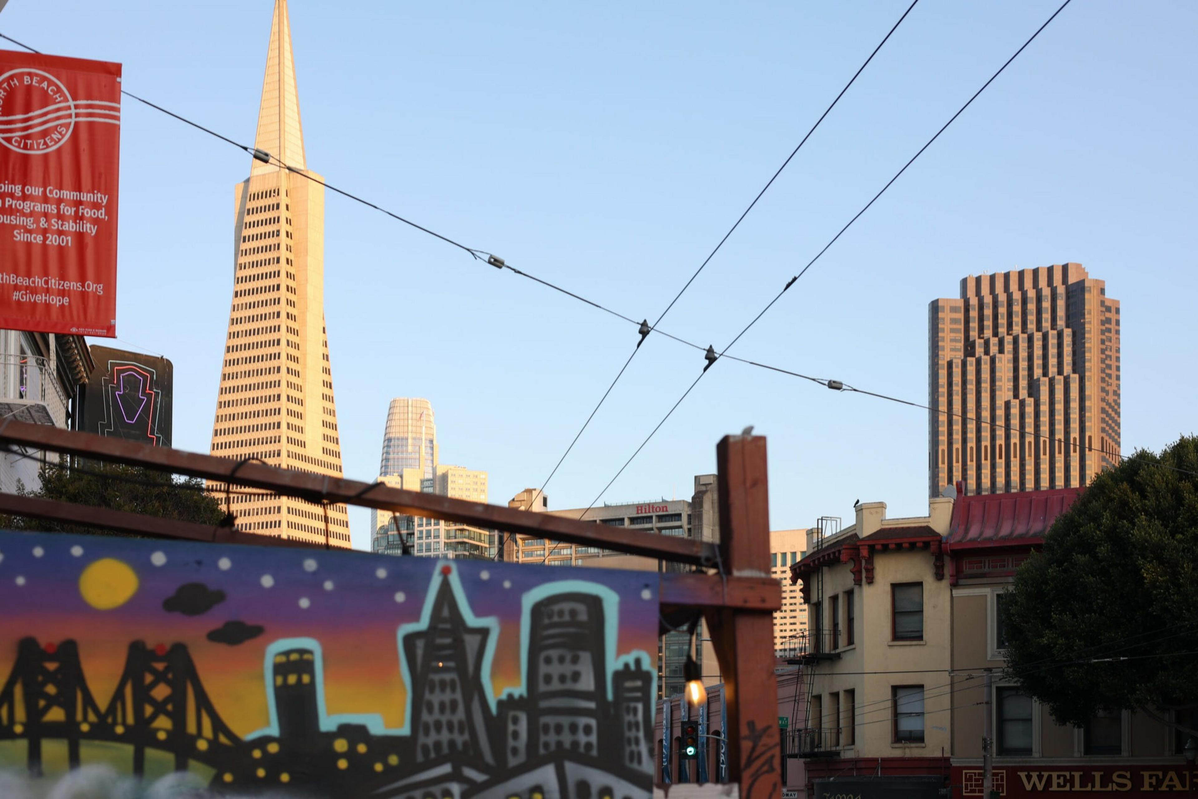 The Transamerica tower looms over North Beach business parklets.