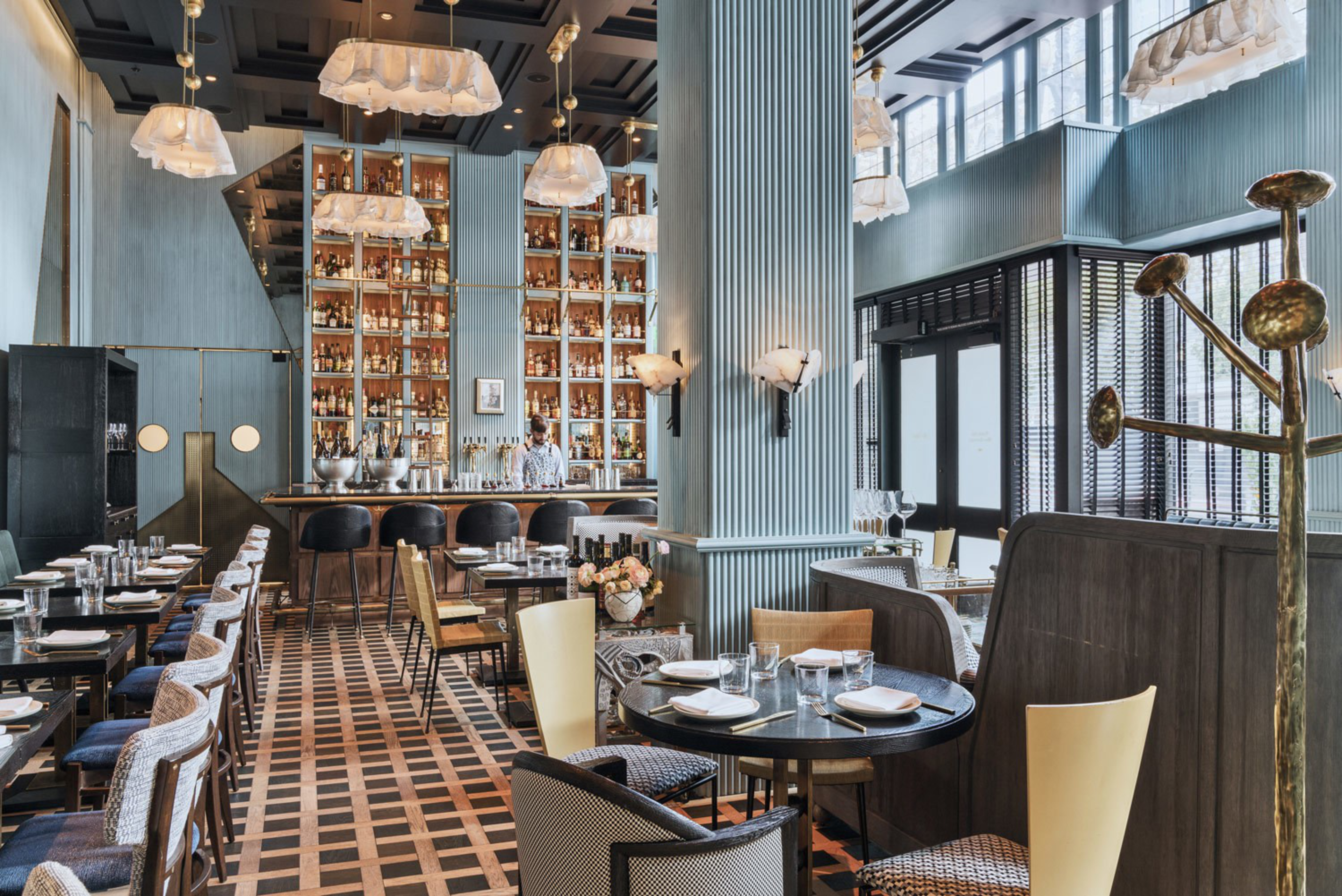 San Francisco's Proper Hotel Villon dining room features high ceilings, a bar and elegant seating.