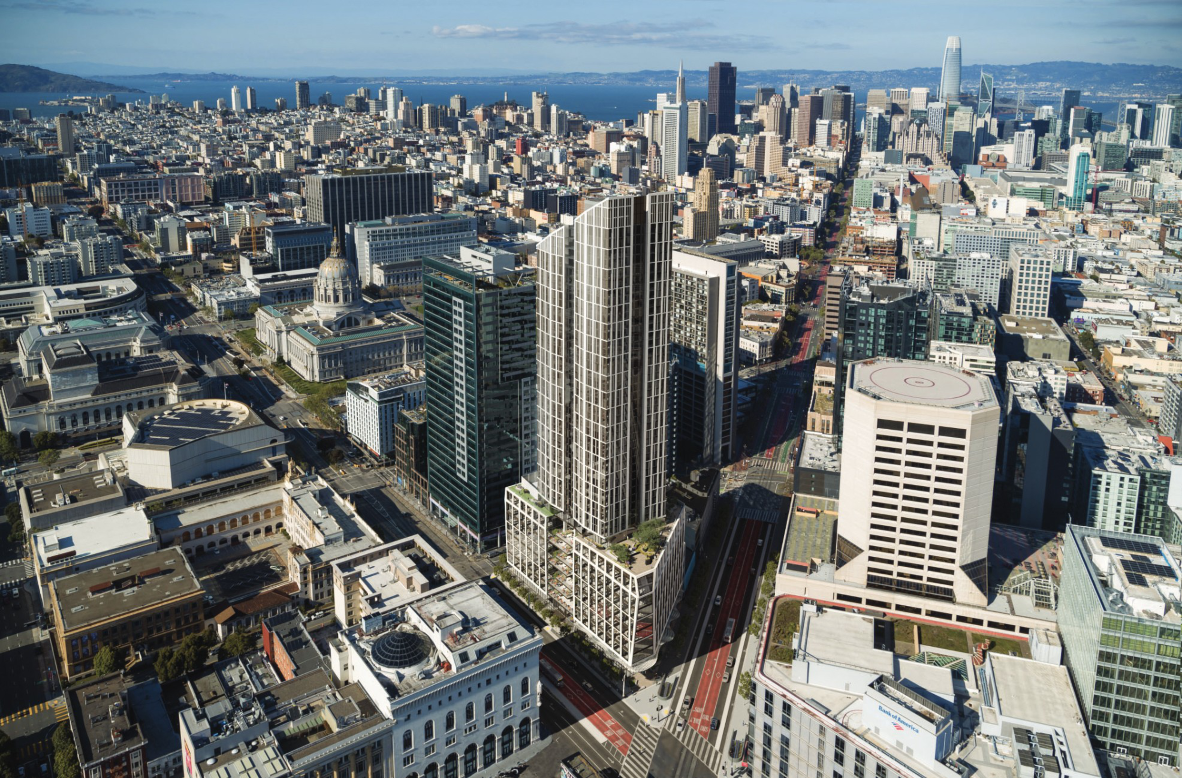 A dense urban skyline with modern skyscrapers, historic domed buildings, and streets converging toward a waterfront in the distance under a blue sky.