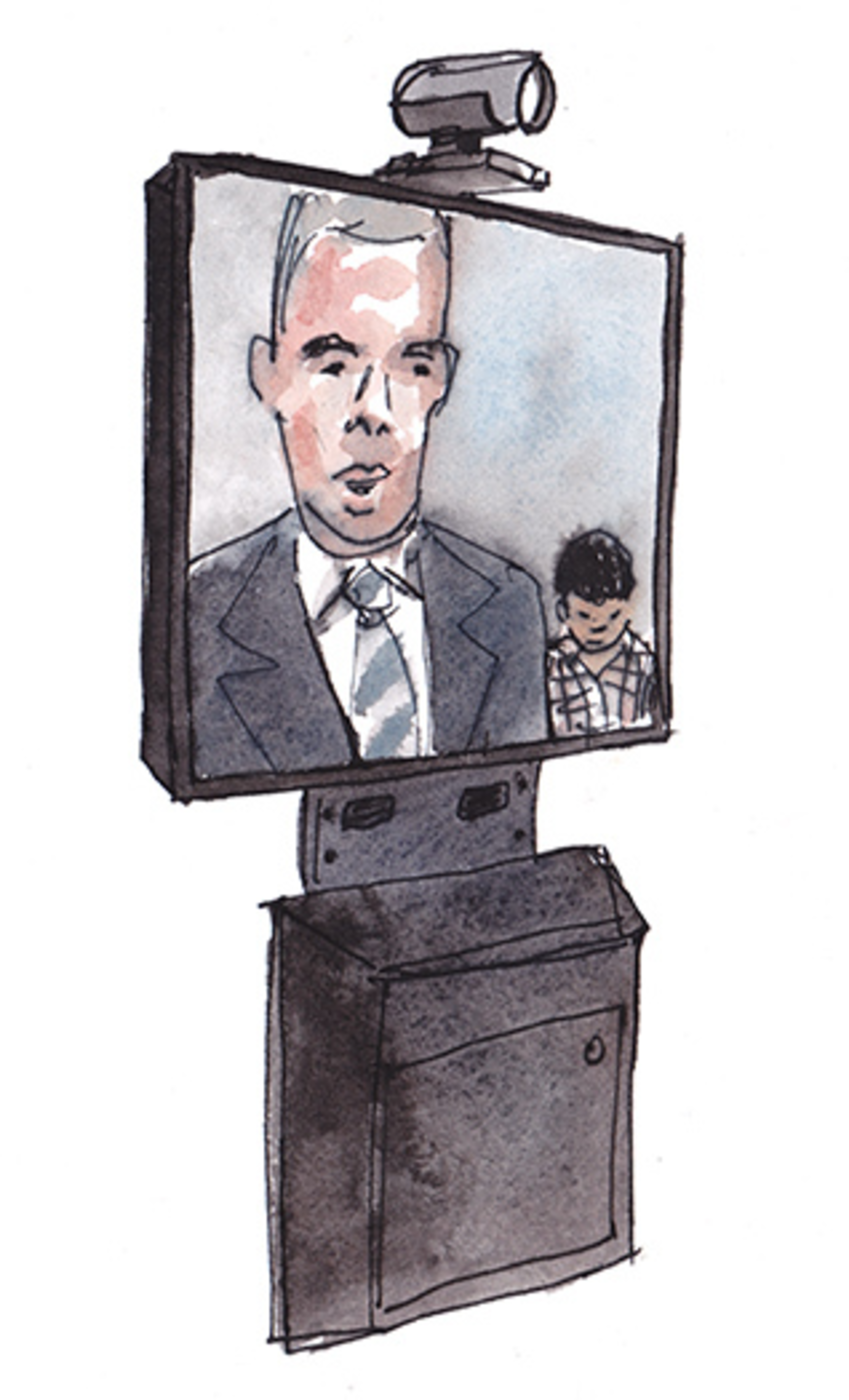 A video conferencing machine displays a man in a suit and tie speaking, with a young boy in a checked shirt visible behind him.