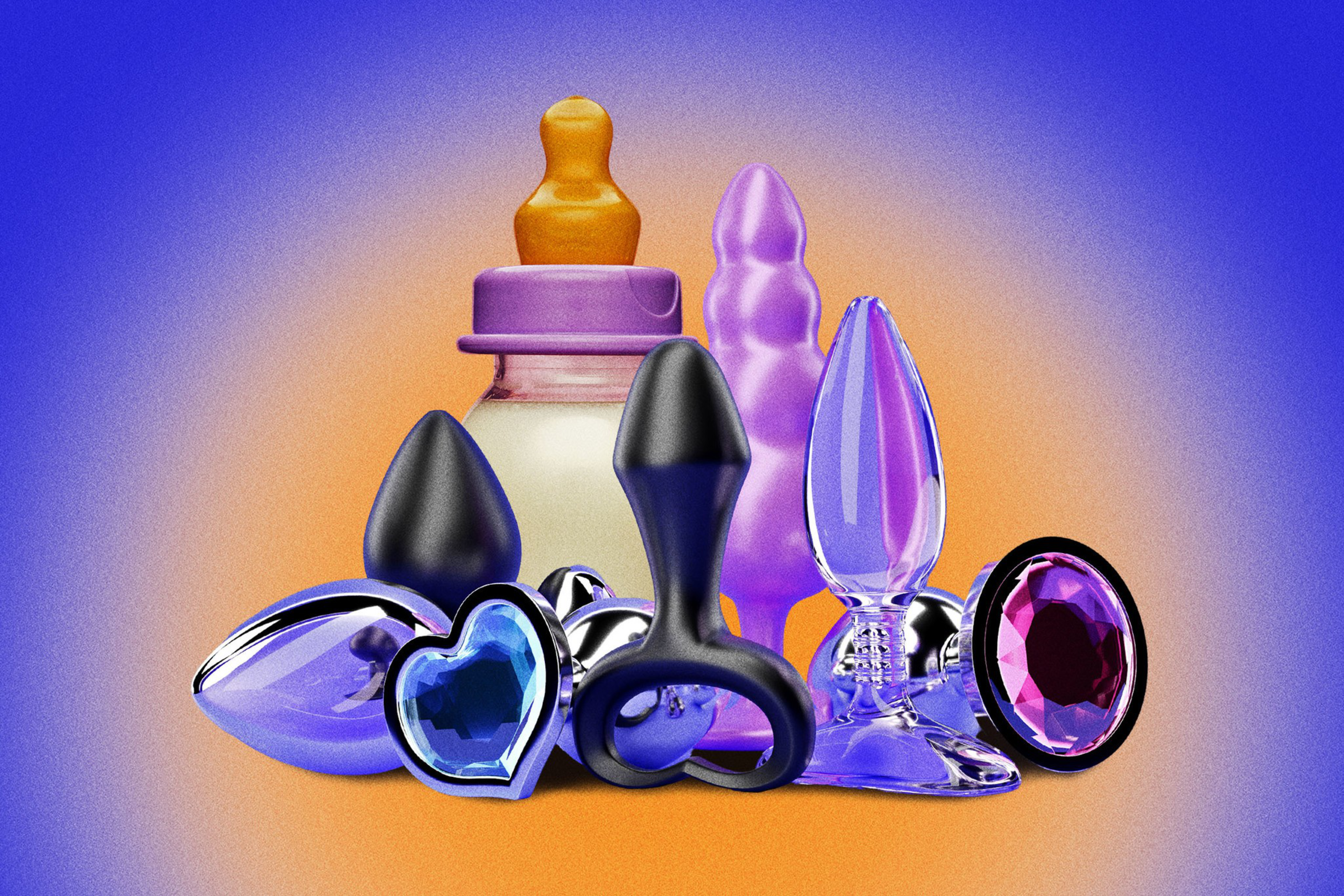 Various adult toys, including several butt plugs with jeweled bases in different shapes and colors, are arranged in front of a baby bottle with a purple lid.