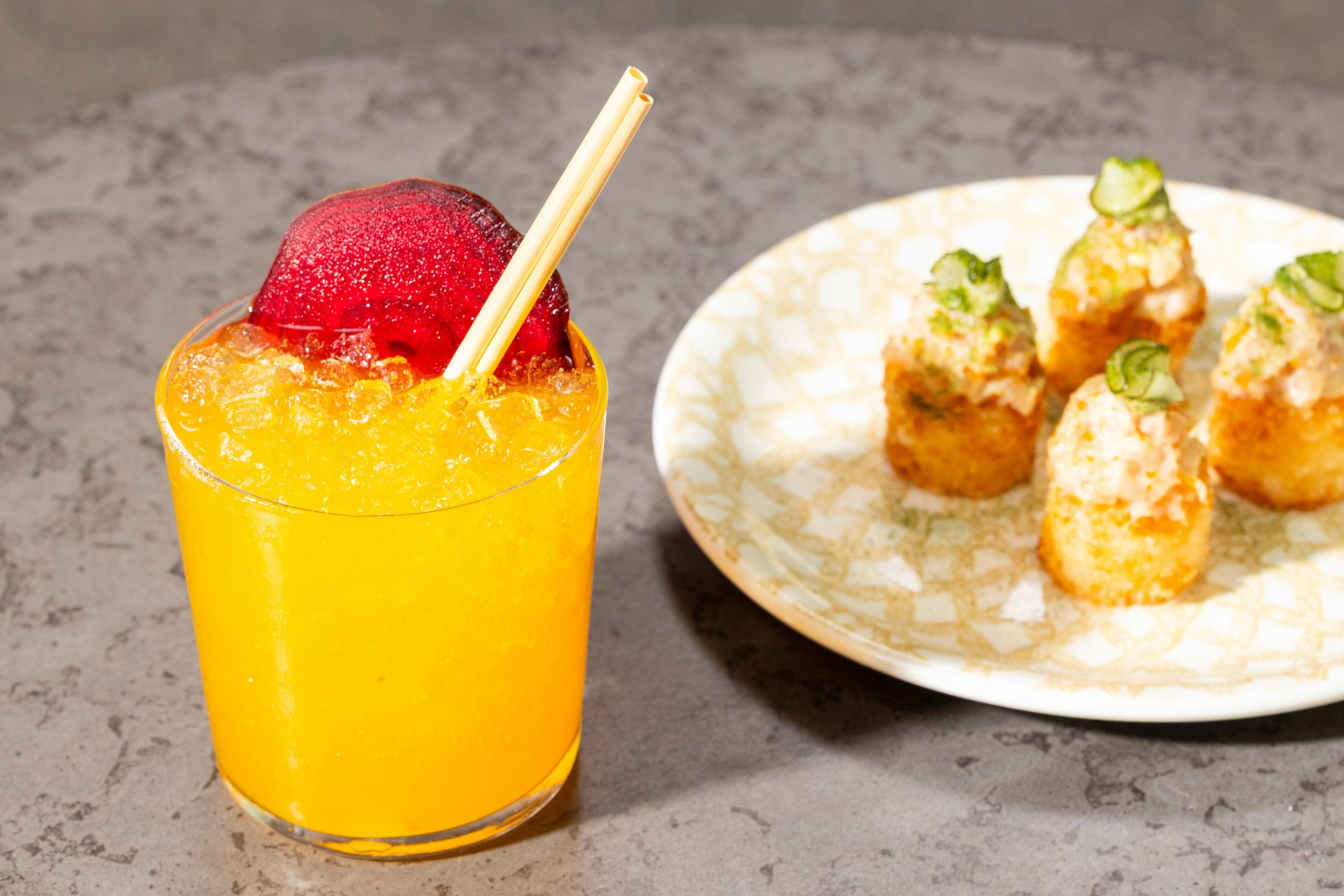 A Tam Tam cocktail and albacore tuna bite at Bar Darling