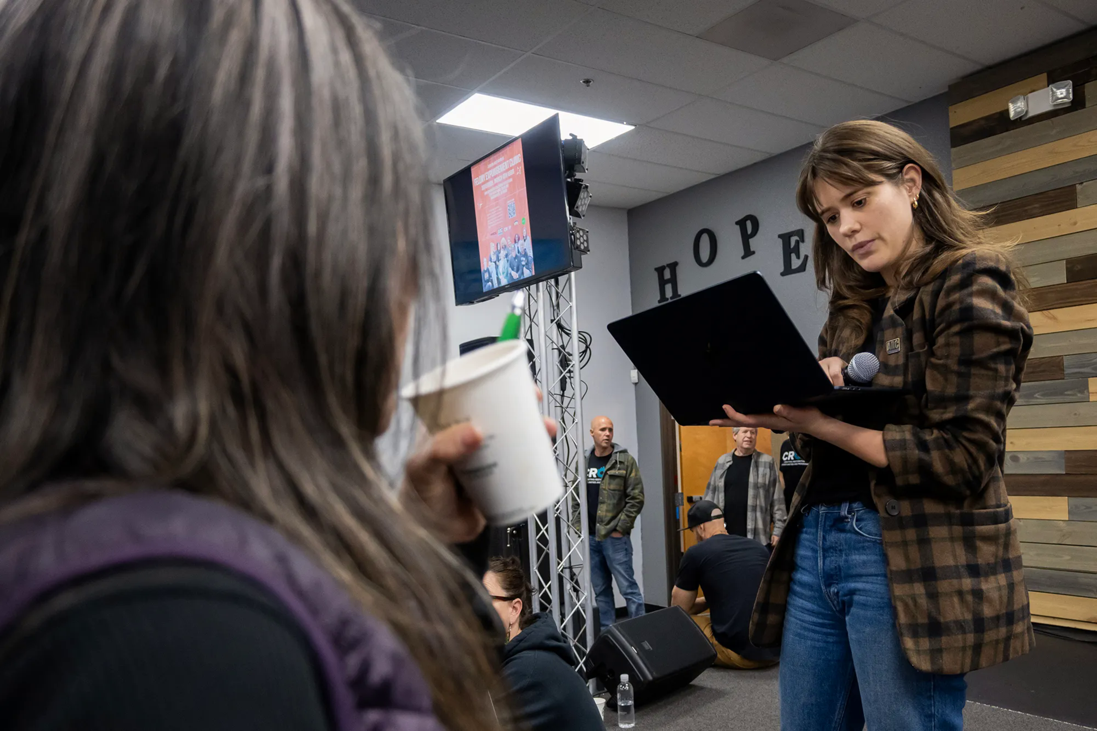 Woman reads from computer