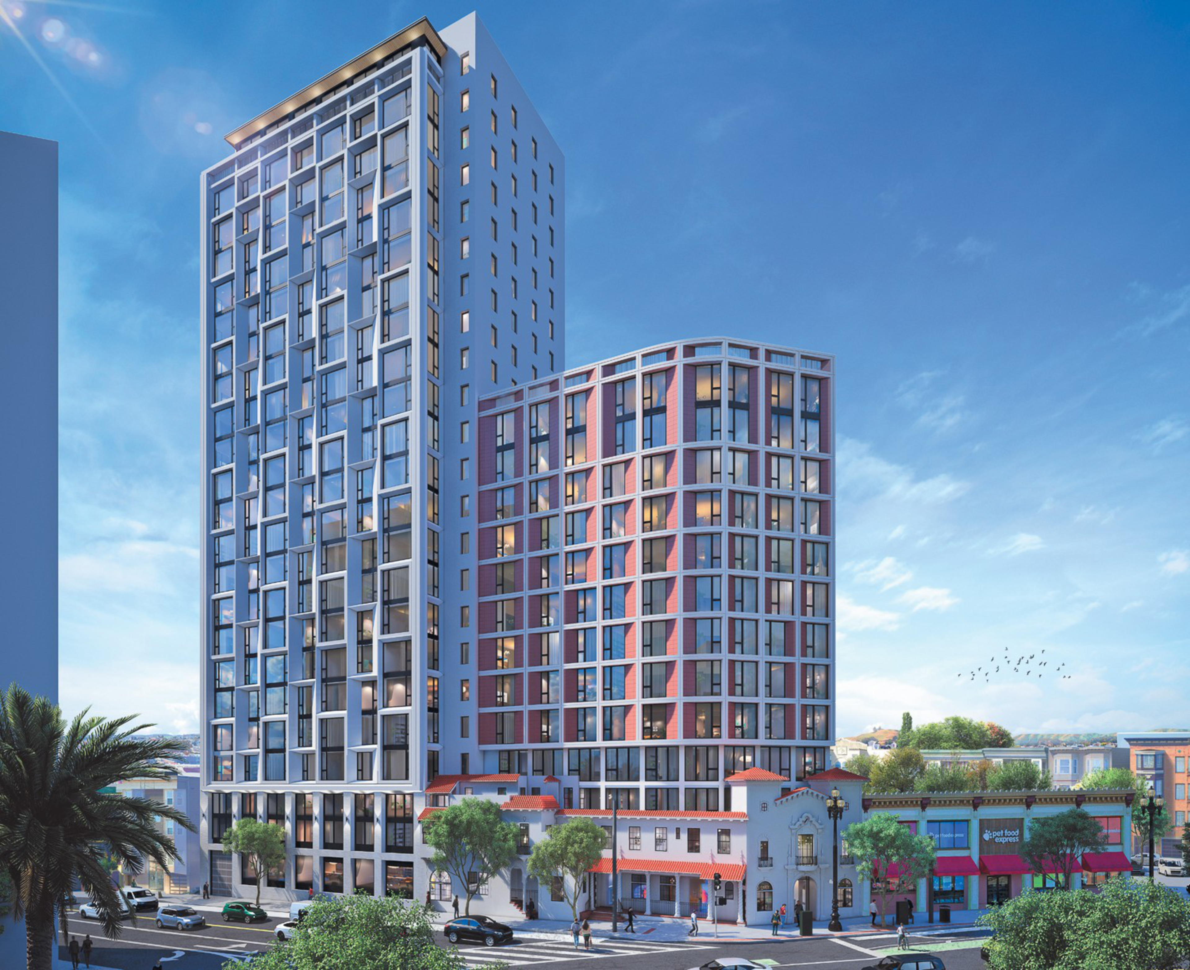 The image shows two modern, high-rise buildings with many windows, adjacent to a traditional, colorful low-rise structure on a busy street lined with trees and parked cars.