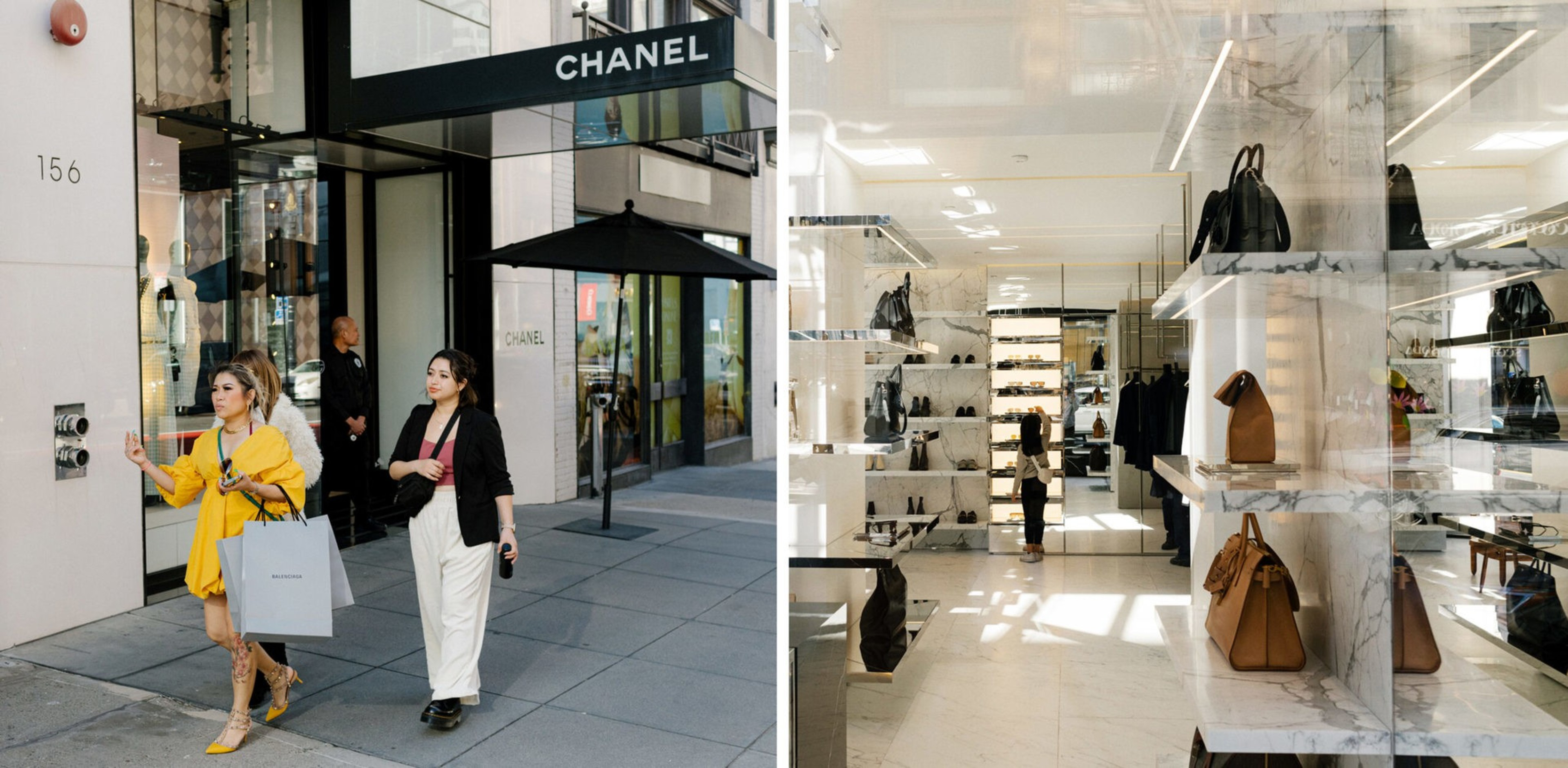 Two women walk past a Chanel store entrance; inside, the boutique displays leather handbags and shoes on white marble shelves with bright lighting.