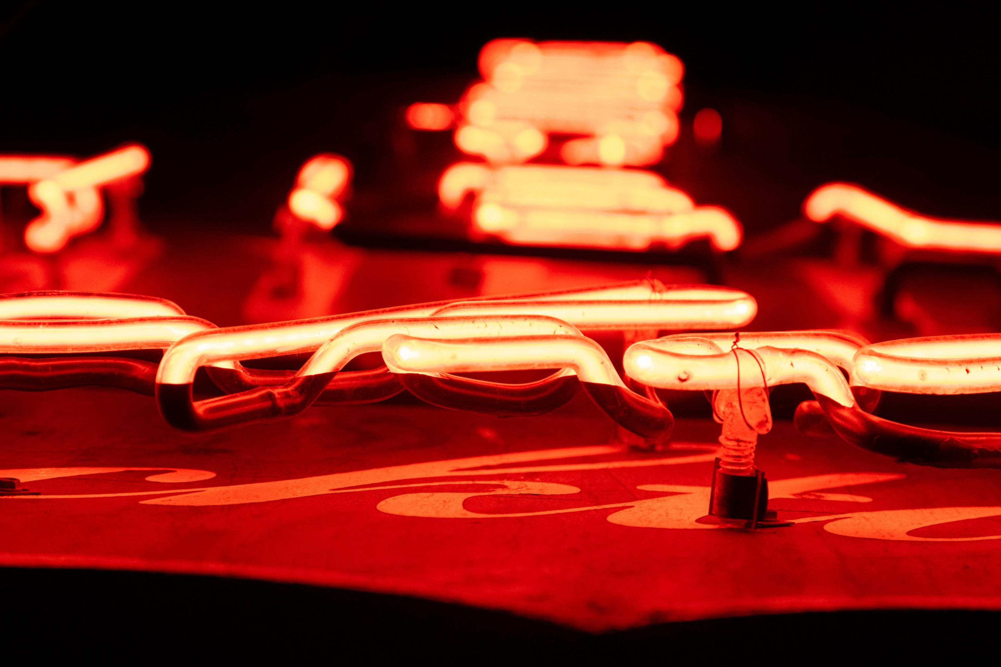 A detail photo of red neon signage.