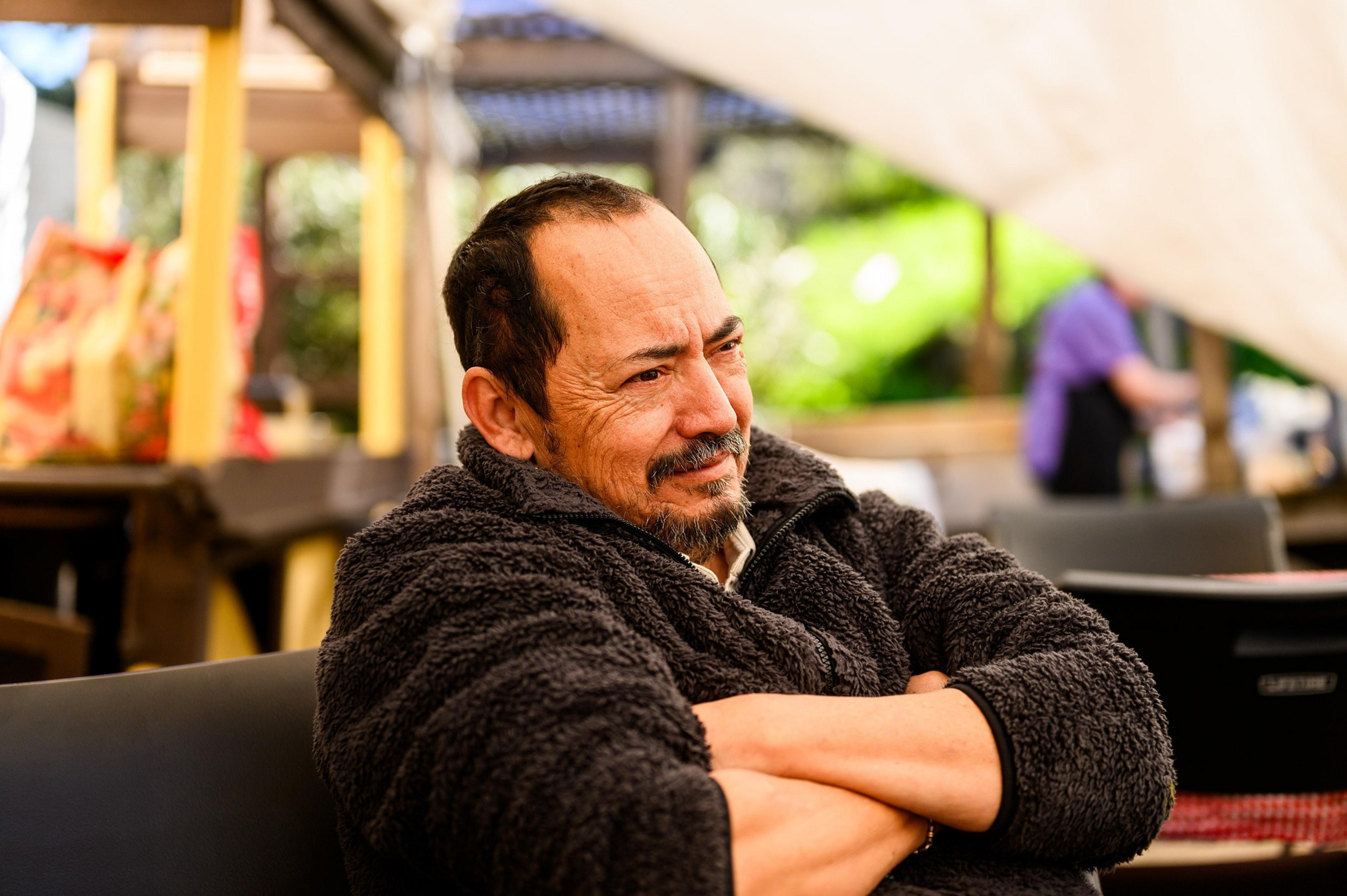 Jaime Norberto sits in his restaurant La Casa de Maria on Saturday, Feb. 10, 2024, in Oakland. Norberto advertises his restaurant in videos by Gregorio Ramon whose social media posts document Oakland life, crime and food.