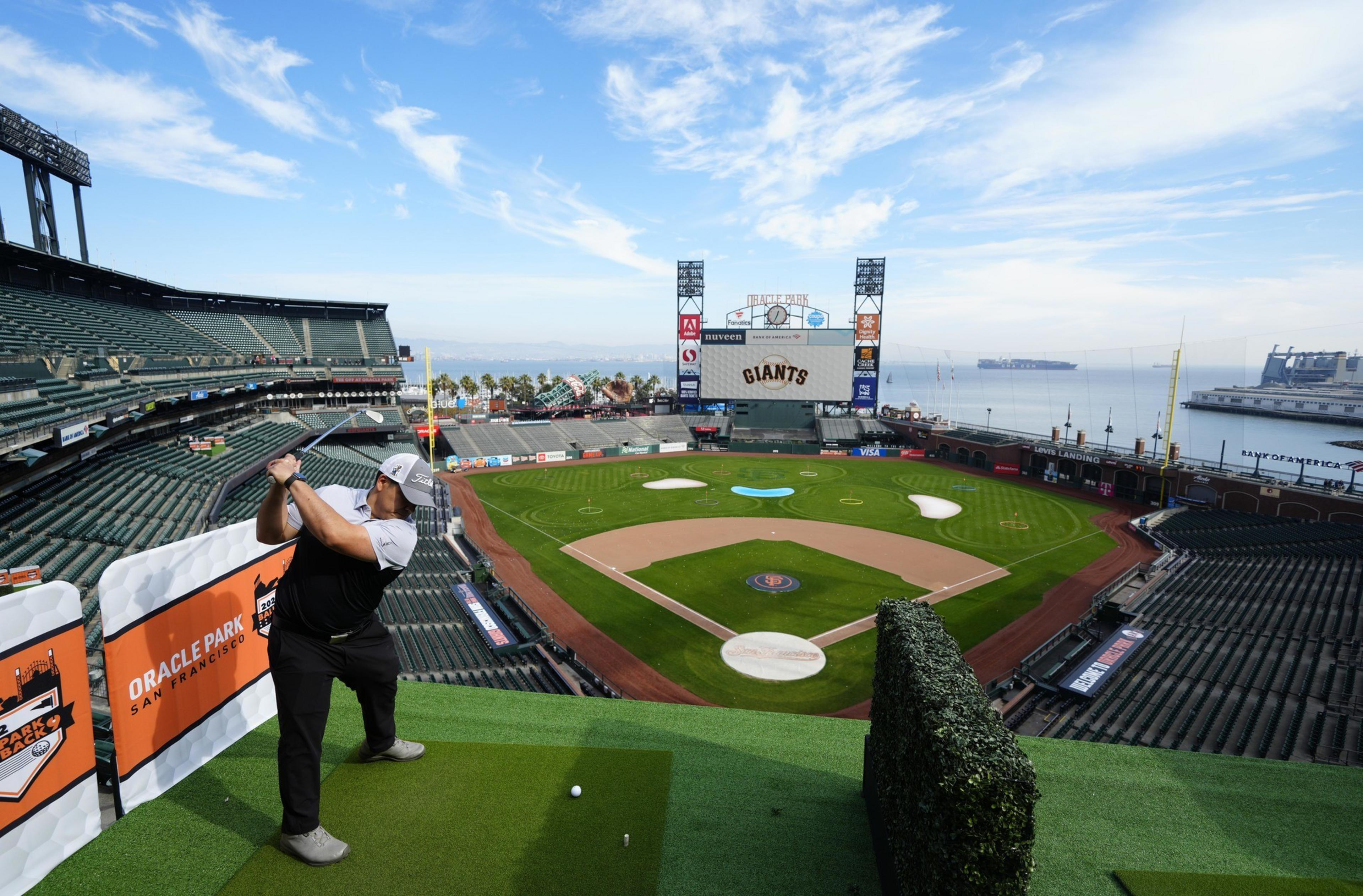 A man playing gold at Oracle Park.