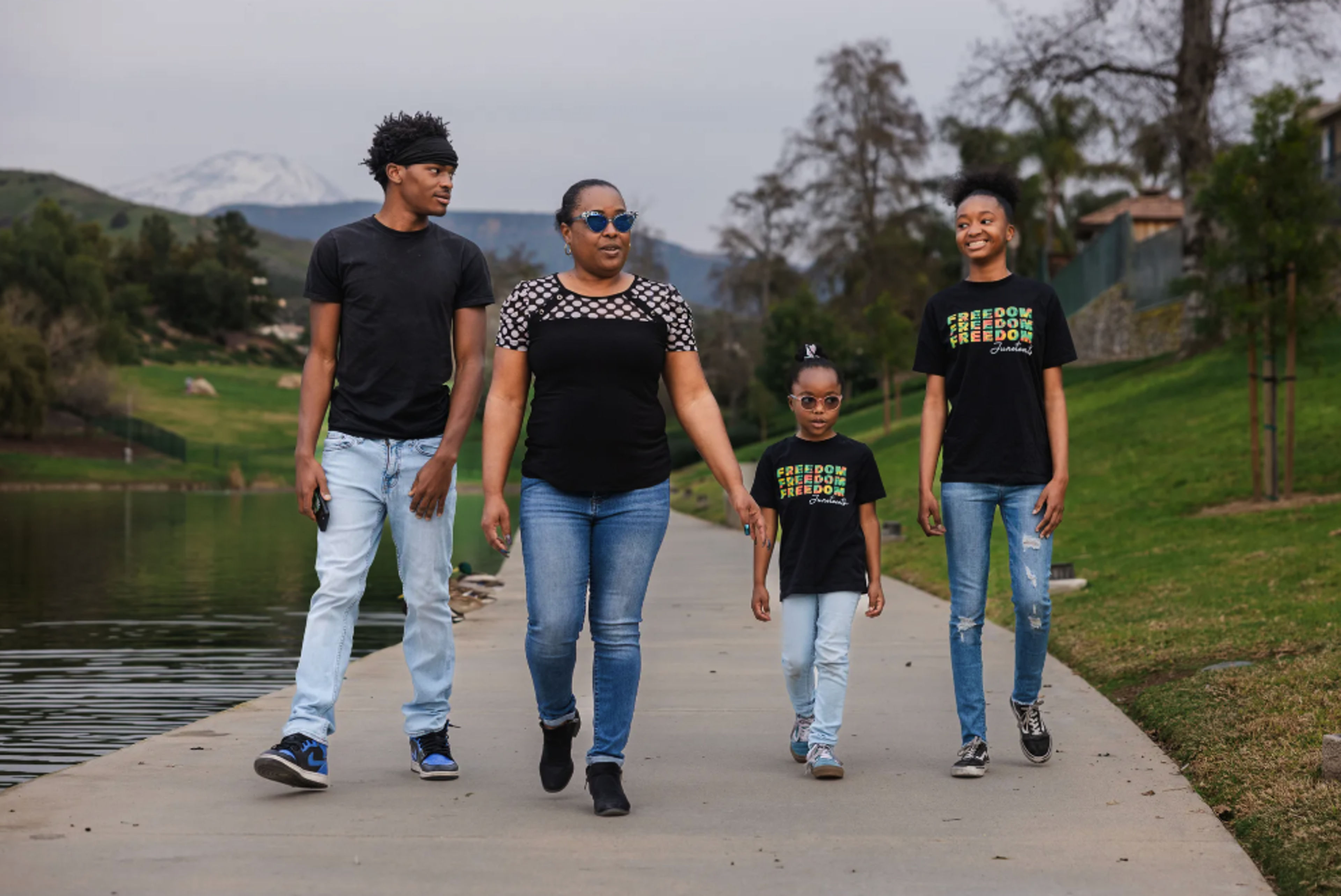 Family walks on path