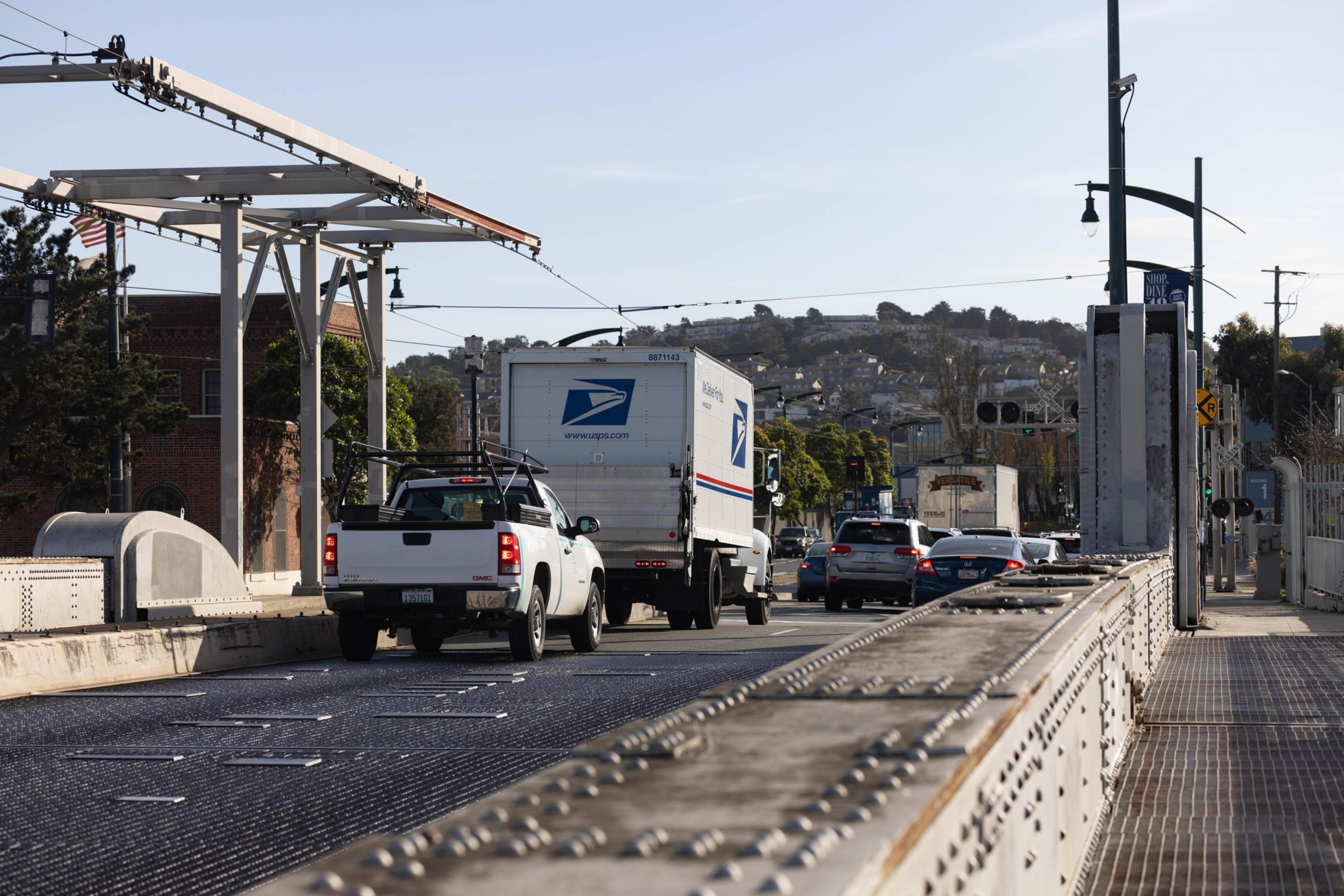 Cars cross over the Islais Creek Bridge.