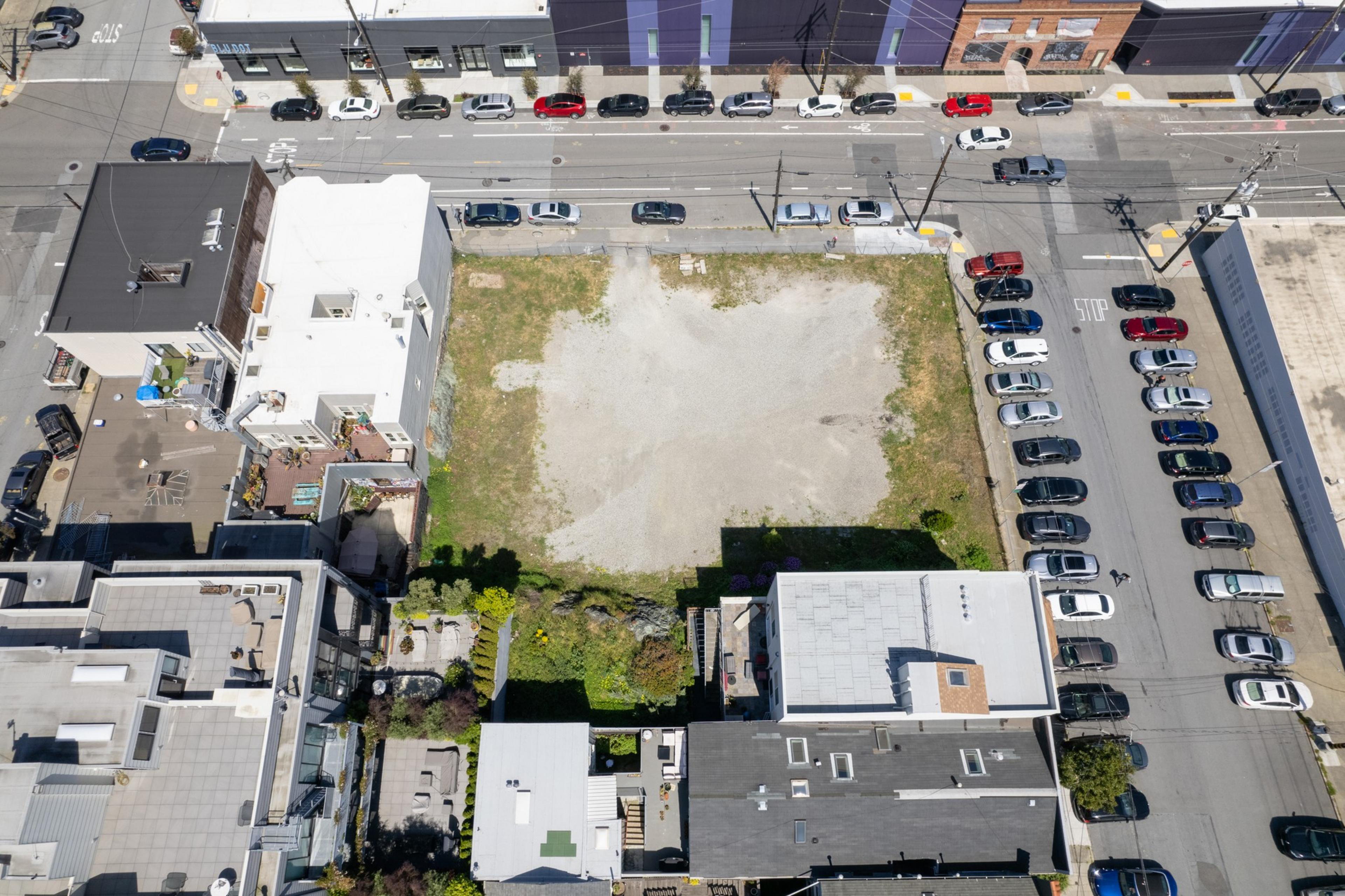 An empty plot of land is seen in a photo.