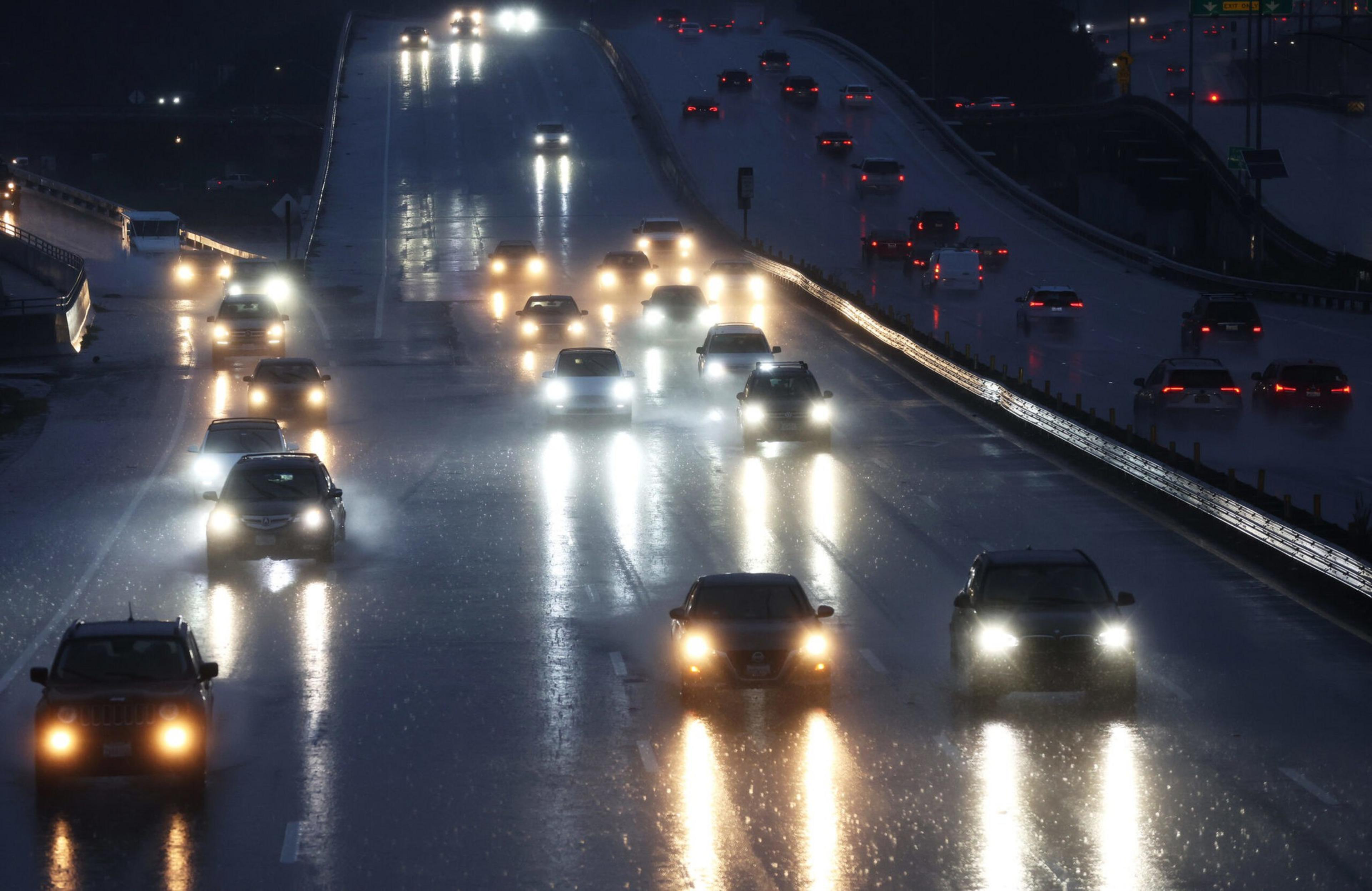 Cars drive along Highway 101 as rain falls on Jan. 4, 2023, in Marin County. | Justin Sullivan/Getty Images