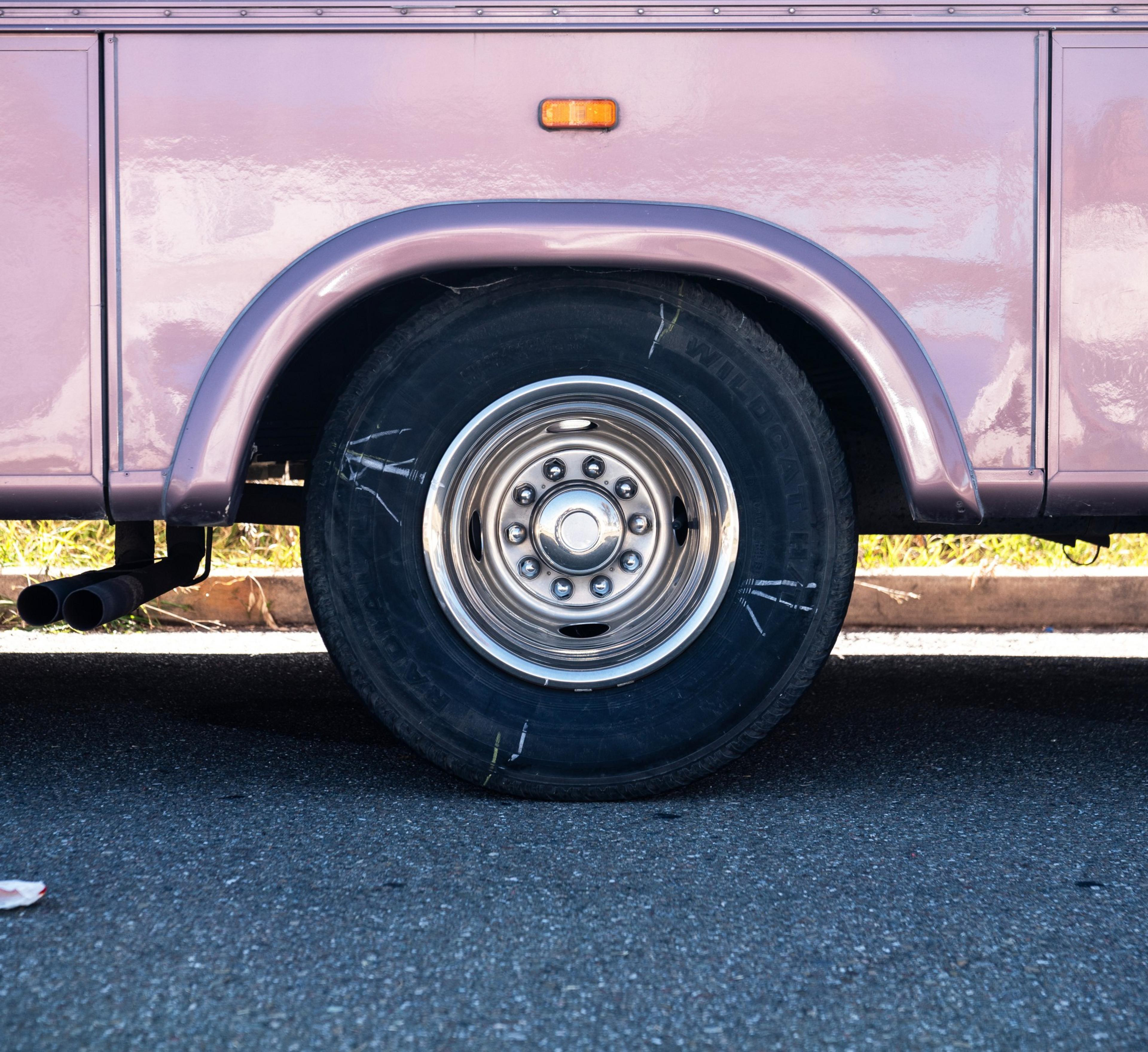 The image shows the rear wheel with parking control chalk marks.